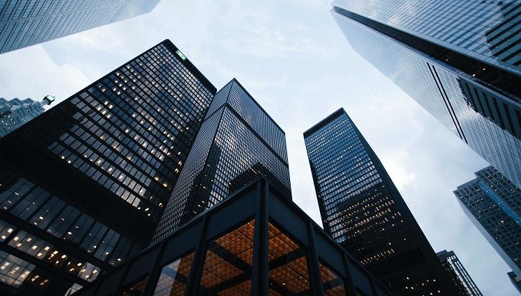 Glass office towers seen from below